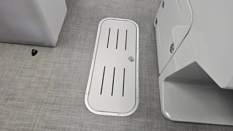 Slide: The Image of 2025 Bentley Pontoons Legacy 223 Swingback interior floor hatch detail. - 7
