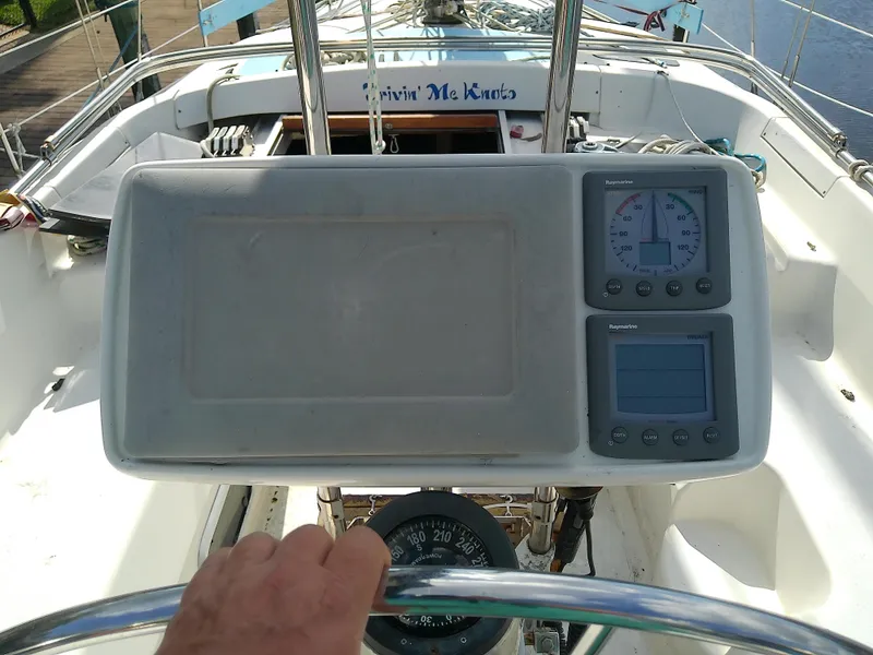 Slide: The Image of Cockpit view of 1990 Hunter Passage 42 sailboat with navigation instruments. - 15