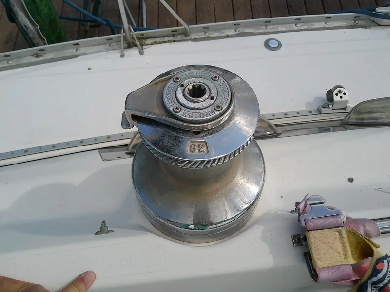Slide: The Image of Winch on 1990 Hunter Passage 42 sailboat deck, used for sail handling. - 25
