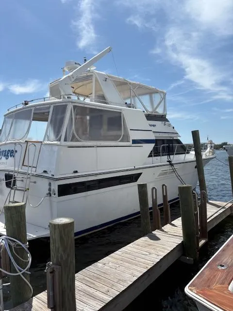 Slide: The Image of 1990 Californian 45 Motor Yacht docked under clear blue sky. - 14