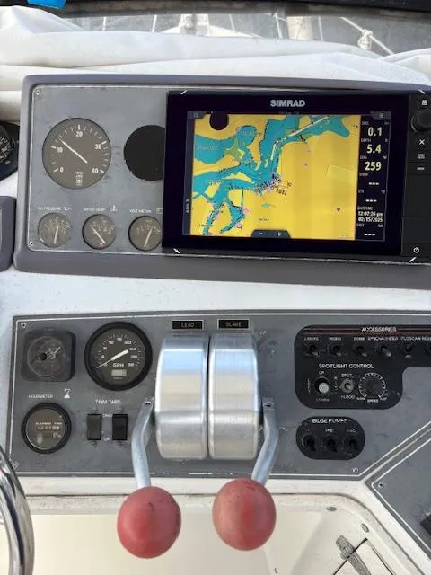 Slide: The Image of Control panel of a 1990 Californian 45 Motor Yacht with navigation display. - 20