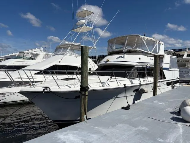 Slide: The Image of 1990 Californian 45 Motor Yacht docked at marina under clear blue sky. - 7