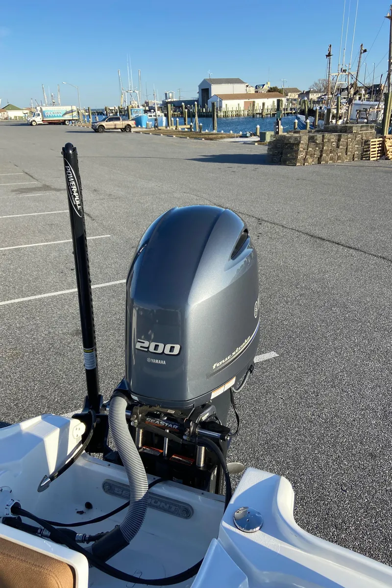 Slide: The Image of 2021 Sea Hunt BX 22 BR boat with Yamaha 200 engine at marina. - 15