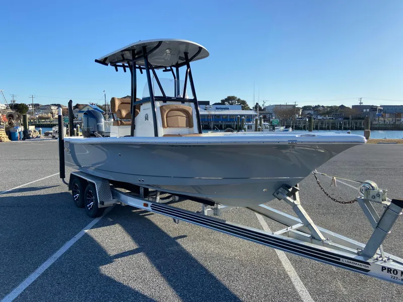 Slide: The Image of 2021 Sea Hunt BX 22 BR boat on trailer with Yamaha outboard motor. - 2