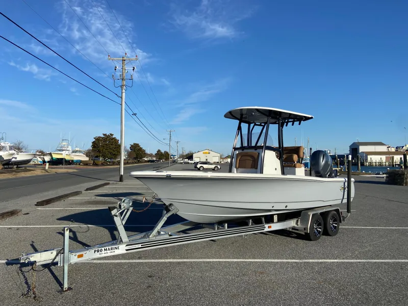 Slide: The Image of 2021 Sea Hunt BX 22 BR boat interior with steering console and seating. - 4