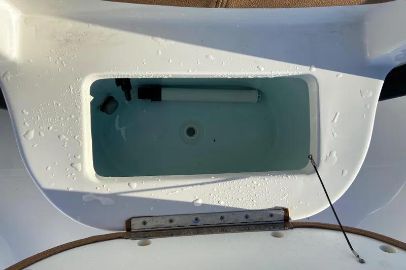 Slide: The Image of Livewell on 2021 Sea Hunt BX 22 BR boat, filled with water. - 9