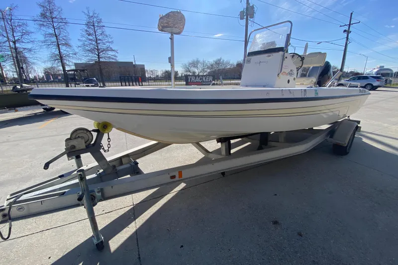 Slide: The Image of 2005 Skeeter ZX20 Bay boat interior with console and seating area. - 17