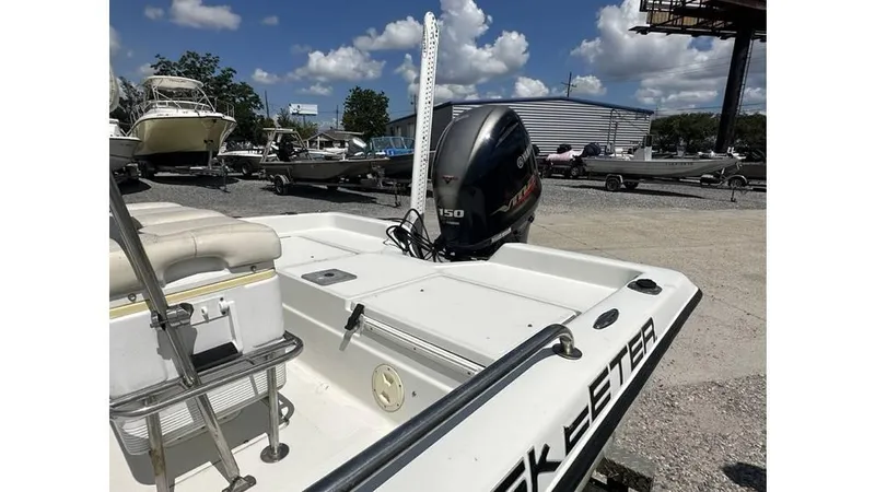 Slide: The Image of 2005 Skeeter ZX20 Bay boat with Yamaha outboard motor on trailer. - 5