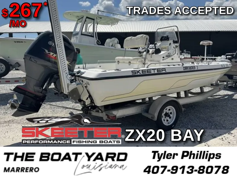 Slide: The Image of 2005 Skeeter ZX20 Bay boat on trailer in outdoor storage area. - 8