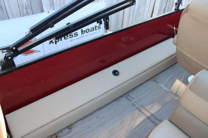 Slide: The Image of 2022 Veranda VR22F2 Luxury boat interior with beige seating and red accents. - 12