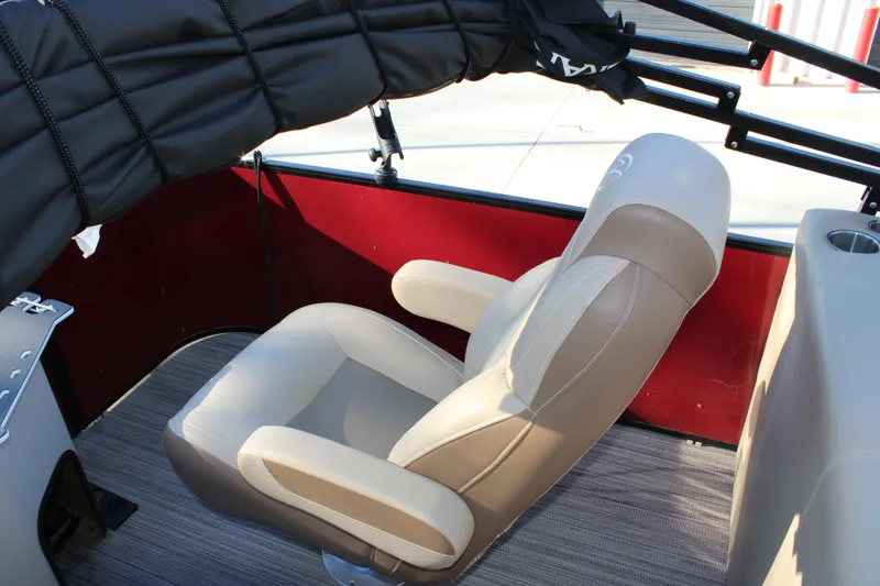 Slide: The Image of 2022 Veranda VR22F2 Luxury boat interior with beige captain's chair and red paneling. - 15