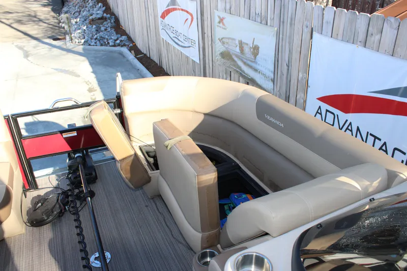 Slide: The Image of 2022 Veranda VR22F2 Luxury pontoon boat with beige seating and modern design. - 2
