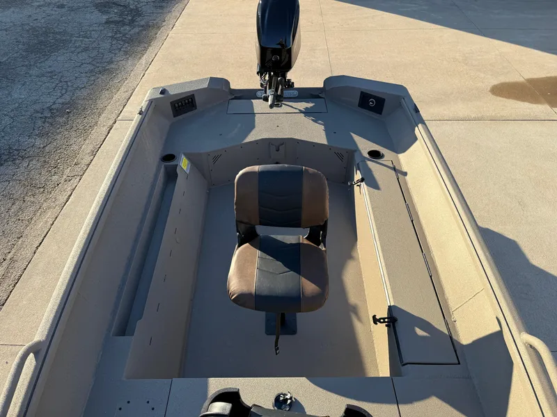 Slide: The Image of 2025 Excel 1651 River Warrior boat interior with seating and motor. - 10