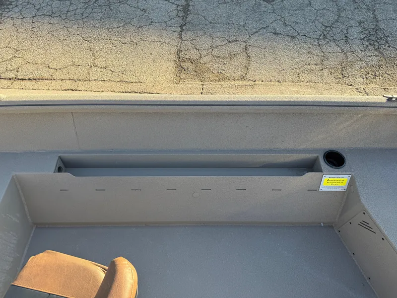 Slide: The Image of 2025 Excel 1651 River Warrior boat interior with seating and storage features. - 12