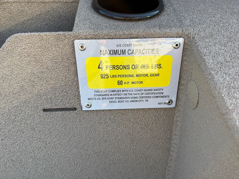 Slide: The Image of 2025 Excel 1651 River Warrior capacity plate, 4 persons or 925 lbs, 60 HP motor. - 19