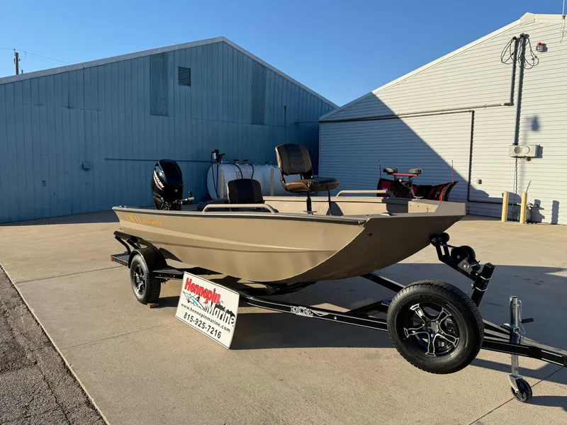 Slide: The Image of 2025 Excel 1651 River Warrior boat on trailer outside a marine shop. - 3
