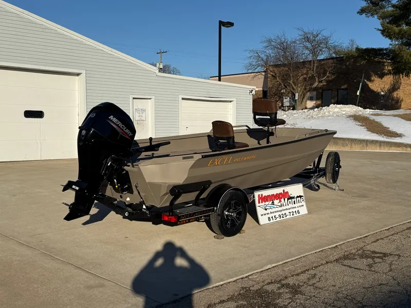 Slide: The Image of 2025 Excel 1651 River Warrior boat on trailer in sunny outdoor setting. - 8