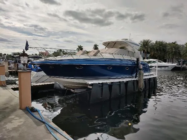 Slide: The Image of 2017 Formula 37 PC yacht docked at marina, calm water, overcast sky. - 10