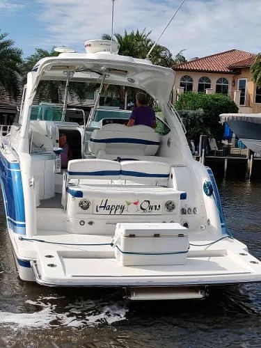 Slide: The Image of 2017 Formula 37 PC yacht docked near waterfront homes. - 12