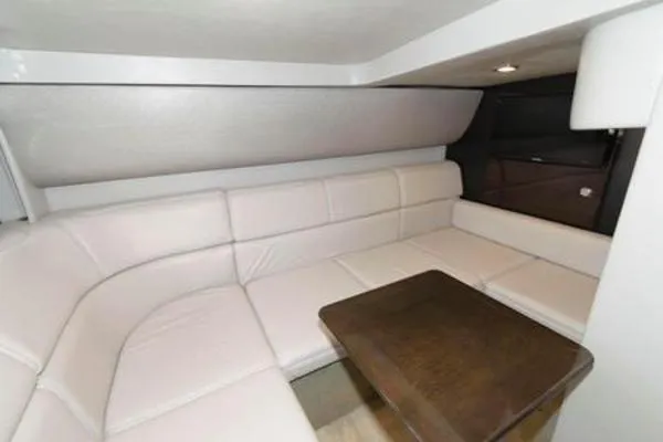 Slide: The Image of Luxurious interior of 2017 Formula 37 PC yacht with plush seating and wooden table. - 25