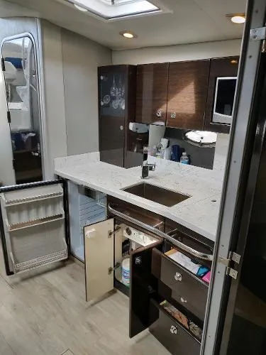 Slide: The Image of Modern kitchen interior of 2017 Formula 37 PC yacht with sleek cabinetry and appliances. - 27