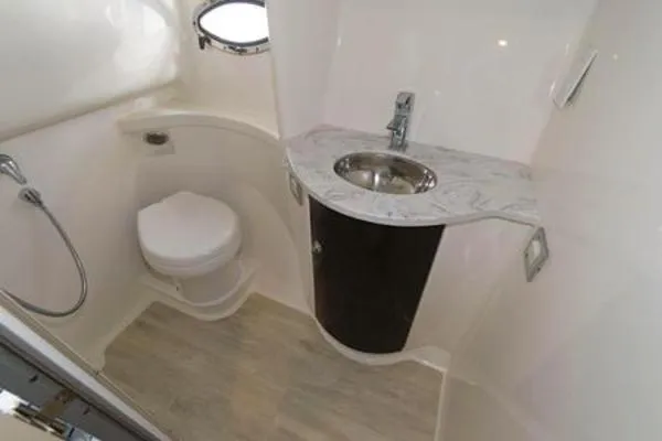 Slide: The Image of 2017 Formula 37 PC yacht bathroom with modern sink and toilet. - 28
