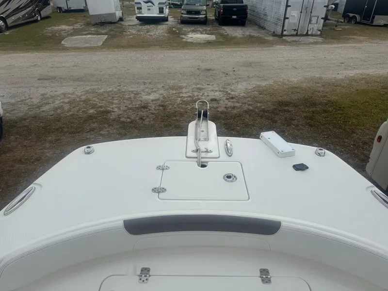 Slide: The Image of 2019 World Cat 230 CC boat bow view in a storage area. - 12