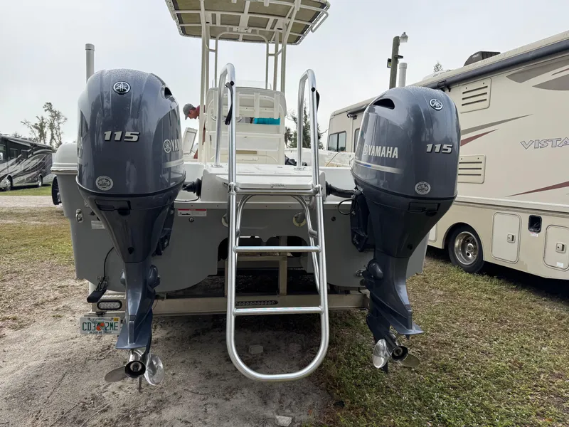 Slide: The Image of 2019 World Cat 230 CC with twin Yamaha 115 engines, rear view. - 2