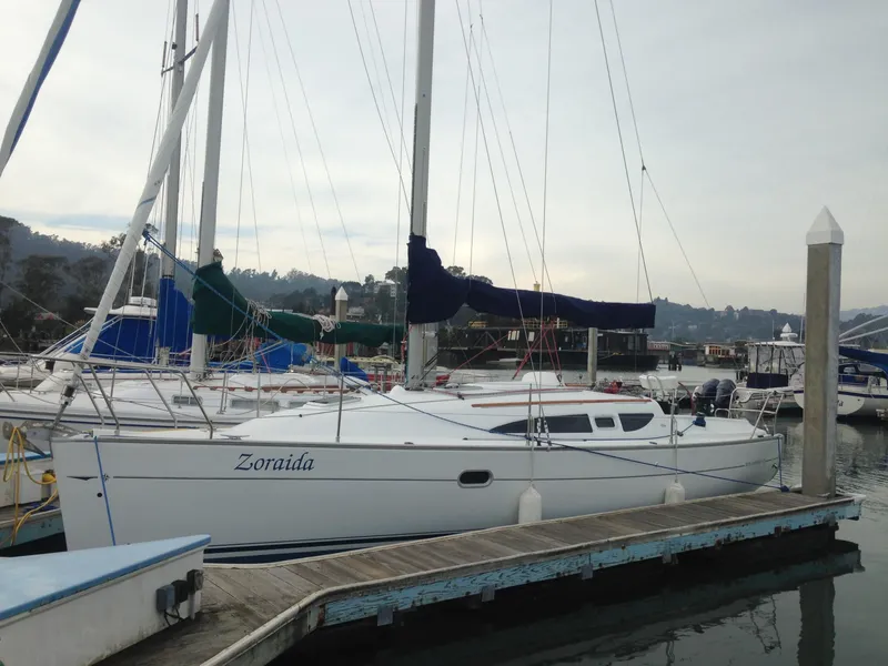 Slide: The Image of 2003 Jeanneau Sun Odyssey 32i sailboat docked at marina. - 13