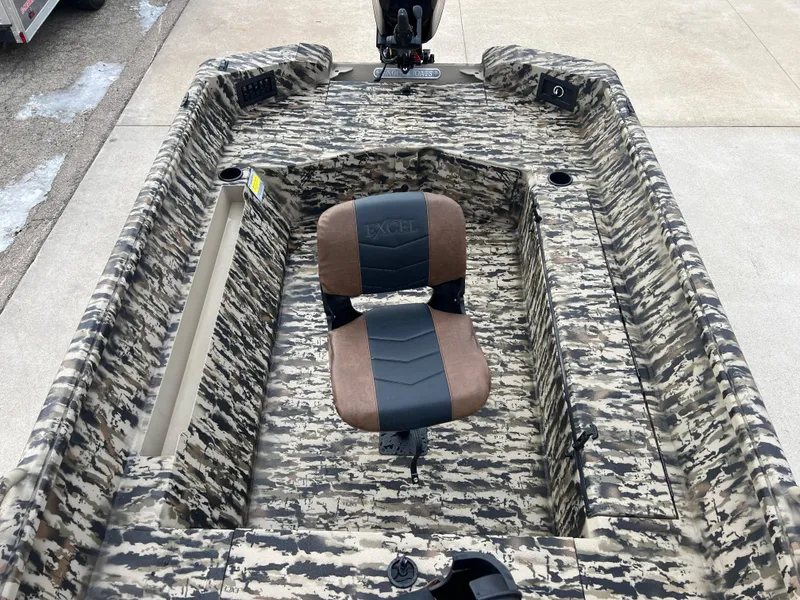 Slide: The Image of 2025 Excel 1651 River Warrior boat with camouflage design and central seat. - 11