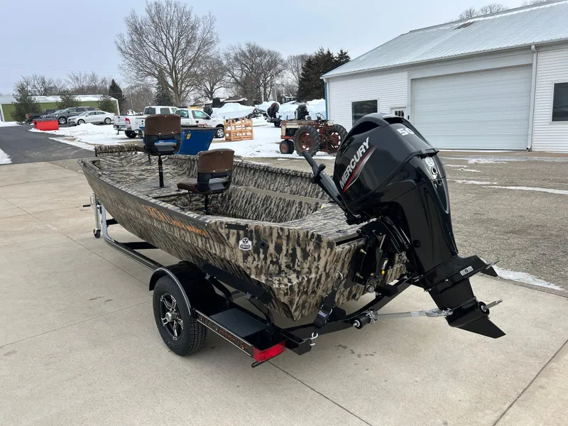 Slide: The Image of 2025 Excel 1651 River Warrior boat with Mercury outboard motor on trailer. - 4