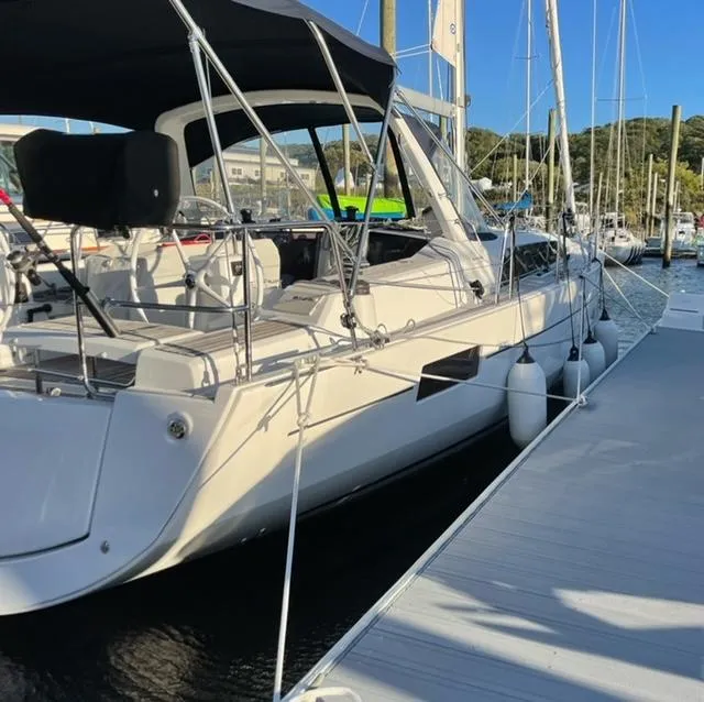 Slide: The Image of 2018 Beneteau Oceanis 41.1 sailboat docked at marina, side view. - 10