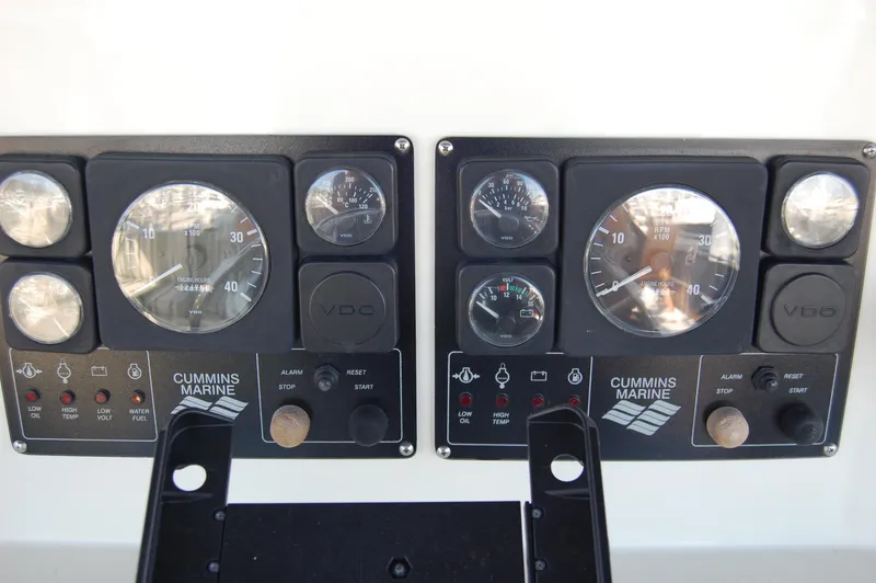 Slide: The Image of Control panel of a 2002 Eagle Pilothouse with Cummins Marine gauges and indicators. - 10