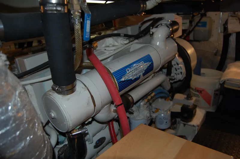Slide: The Image of Engine room of a 2002 Eagle Pilothouse boat, featuring a Diamond Performance engine. - 17