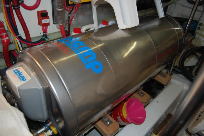 Slide: The Image of Engine room of 2002 Eagle Pilothouse with stainless steel tank and wiring. - 21