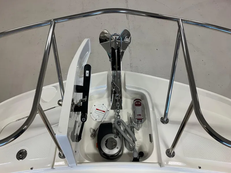 Slide: The Image of 2025 Sea Ray Sundancer 320 anchor system with stainless steel railings. - 23