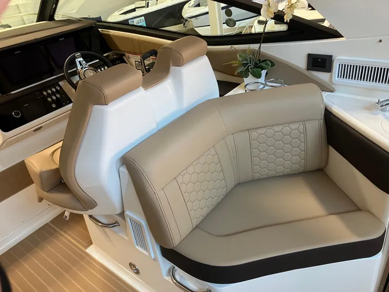 Slide: The Image of Luxurious interior seating of 2025 Sea Ray Sundancer 320 yacht. - 9