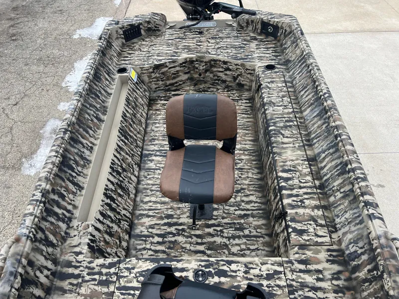 Slide: The Image of 2025 Excel 1751 River Warrior boat with camouflage design and central seating. - 11