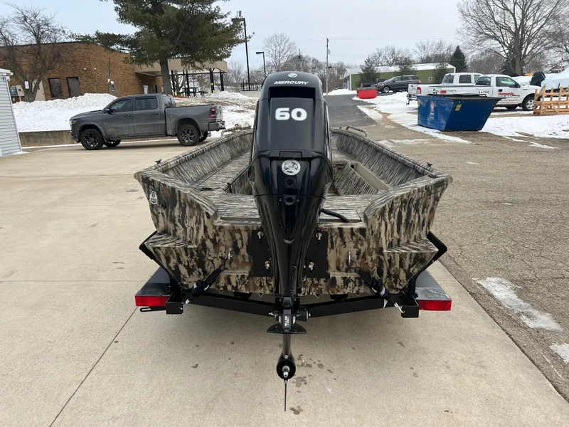 Slide: The Image of 2025 Excel 1751 River Warrior boat with camouflage design and 60 HP Mercury engine. - 5