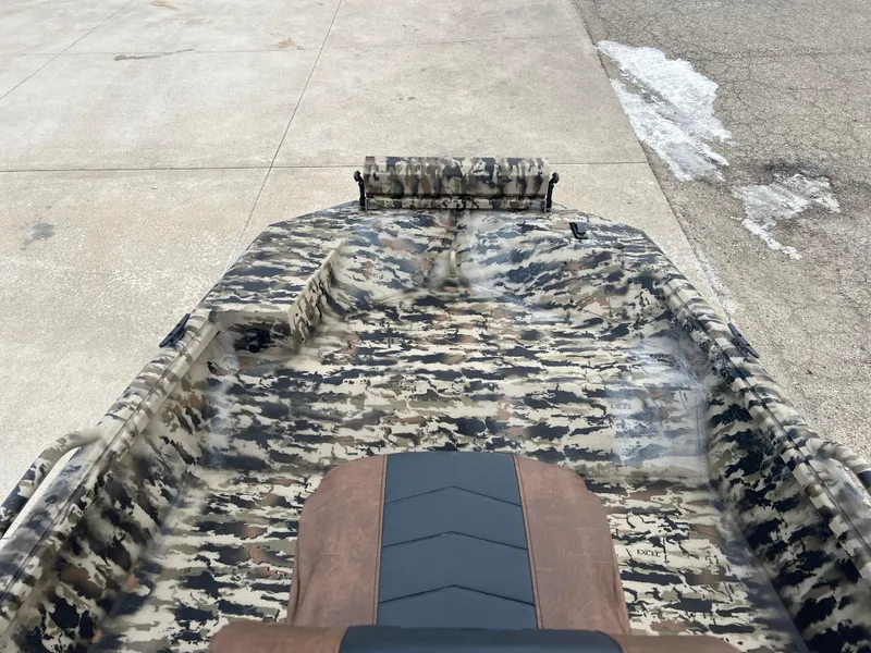 Slide: The Image of 2025 Excel 1751 River Warrior boat with camouflage interior design. - 7