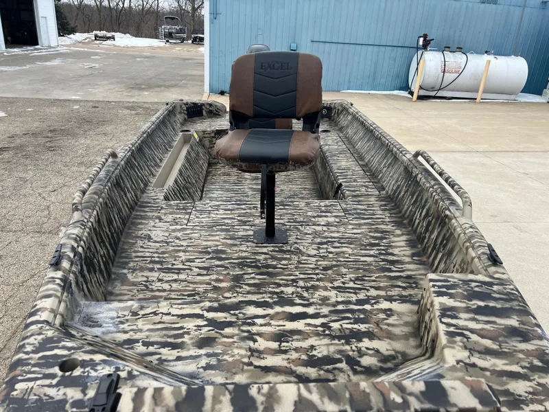 Slide: The Image of 2025 Excel 1751 River Warrior boat with camouflage design and central seat. - 8
