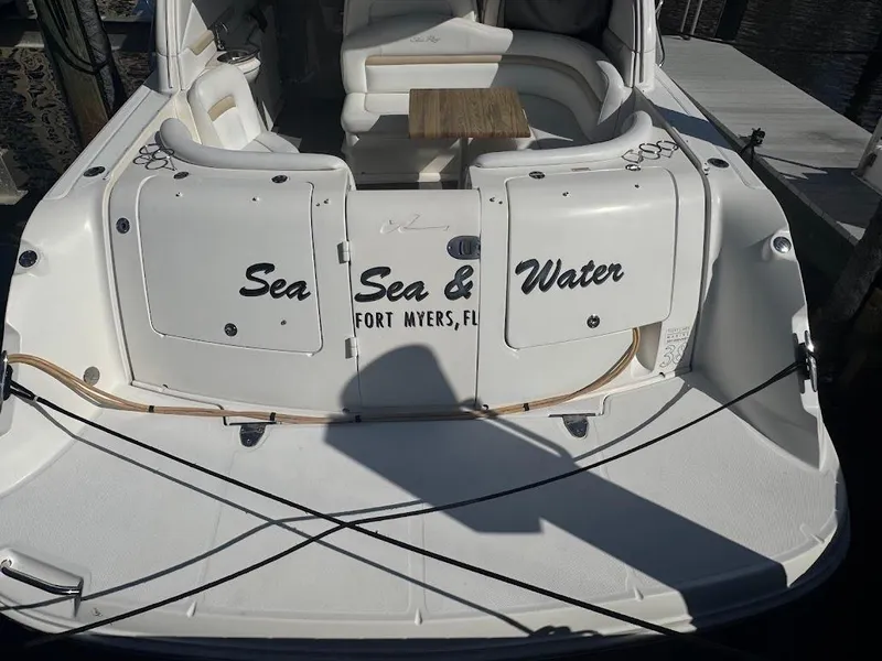 Slide: The Image of 2008 Sea Ray 38 Sundancer boat with "Sea Sea & Water" text, Fort Myers, FL. - 14