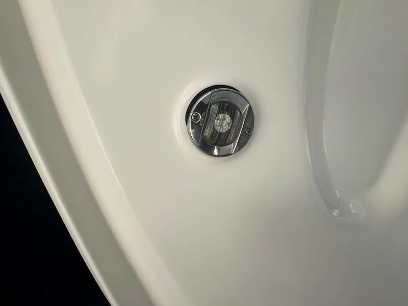 Slide: The Image of Close-up of a 2008 Sea Ray 38 Sundancer boat's chrome fixture on white surface. - 28