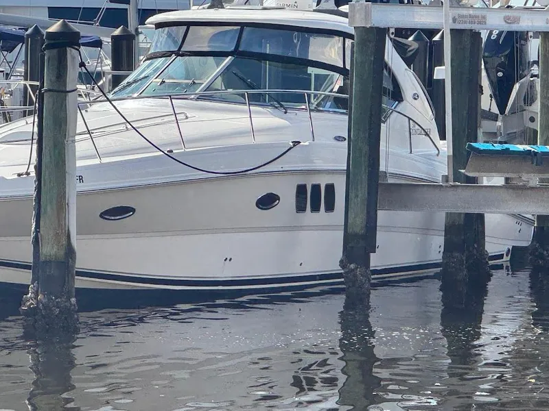 Slide: The Image of 2008 Sea Ray 38 Sundancer yacht docked at marina, side view. - 3