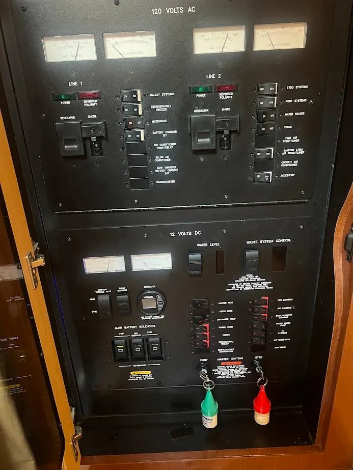 Slide: The Image of Electrical control panel on a 2008 Sea Ray 38 Sundancer boat. - 38