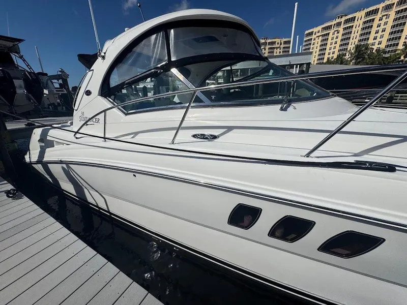 Slide: The Image of 2008 Sea Ray 38 Sundancer yacht docked at marina, side view. - 8