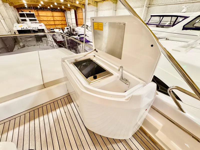 Slide: The Image of Outdoor grill on 2022 Ferretti Yachts 550, showcasing sleek design and functionality. - 64