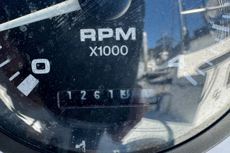 Slide: The Image of Close-up of a Catalina 42 MK II tachometer showing 1261 RPM. - 15