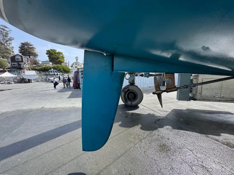 Slide: The Image of Catalina 42 MK II 2001 sailboat keel and propeller in a boatyard setting. - 34