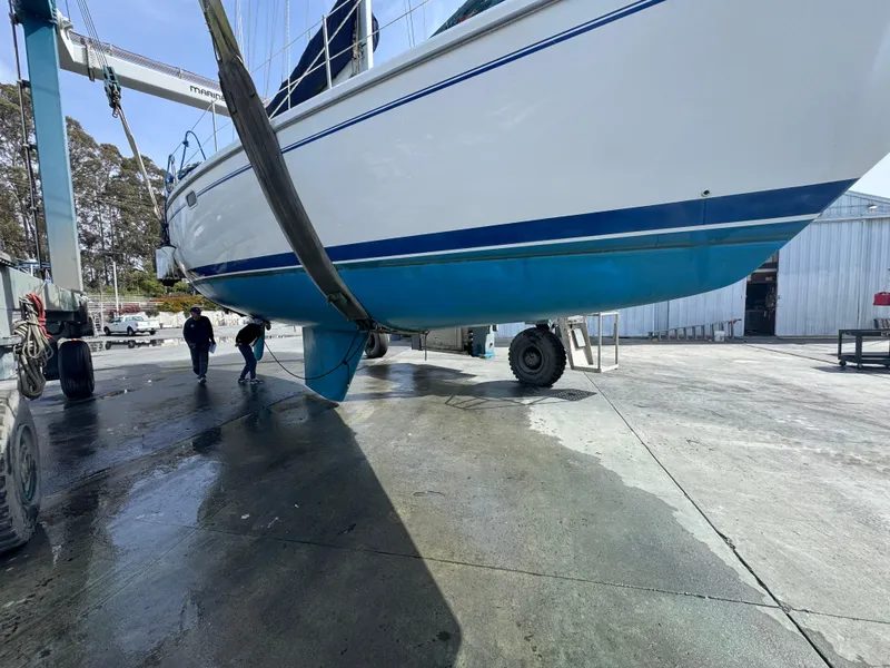 Slide: The Image of 2001 Catalina 42 MK II sailboat on dry dock for maintenance. - 35